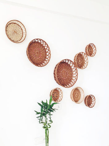 Natural round wicker baskets used for wall installation/ wall décor.