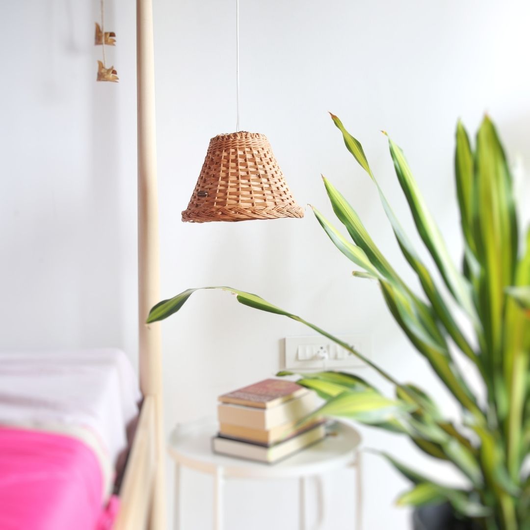 1 wicker handwoven lampshade hung on wall for bed room décor.