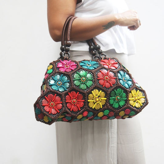 DaisyLife Multi colour 'Dahlia' coconut handbag on model 