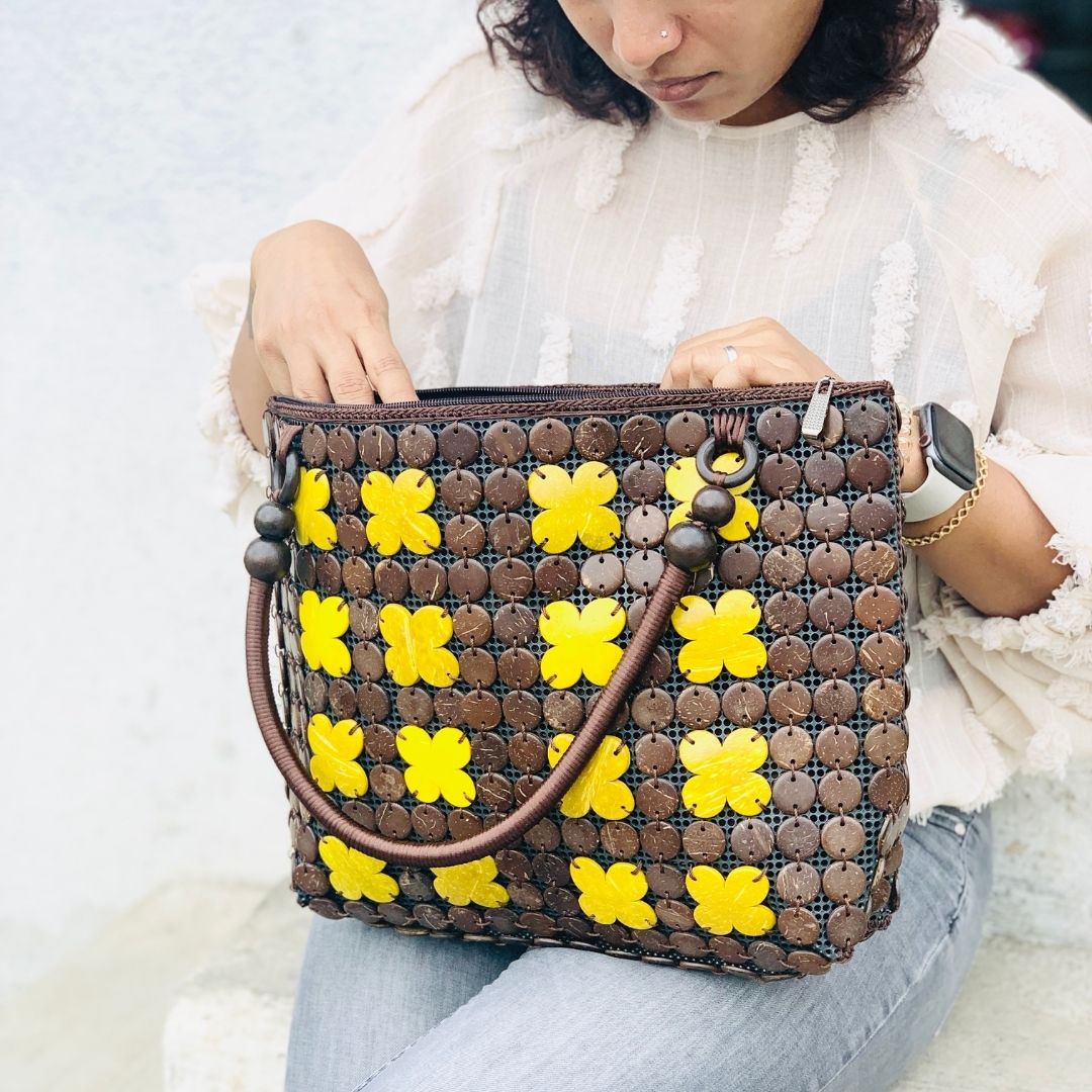 Women carrying natural coconut shell handbag