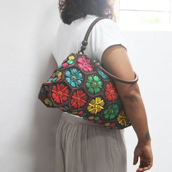 DaisyLife Multi colour 'Dahlia' coconut handbag on model