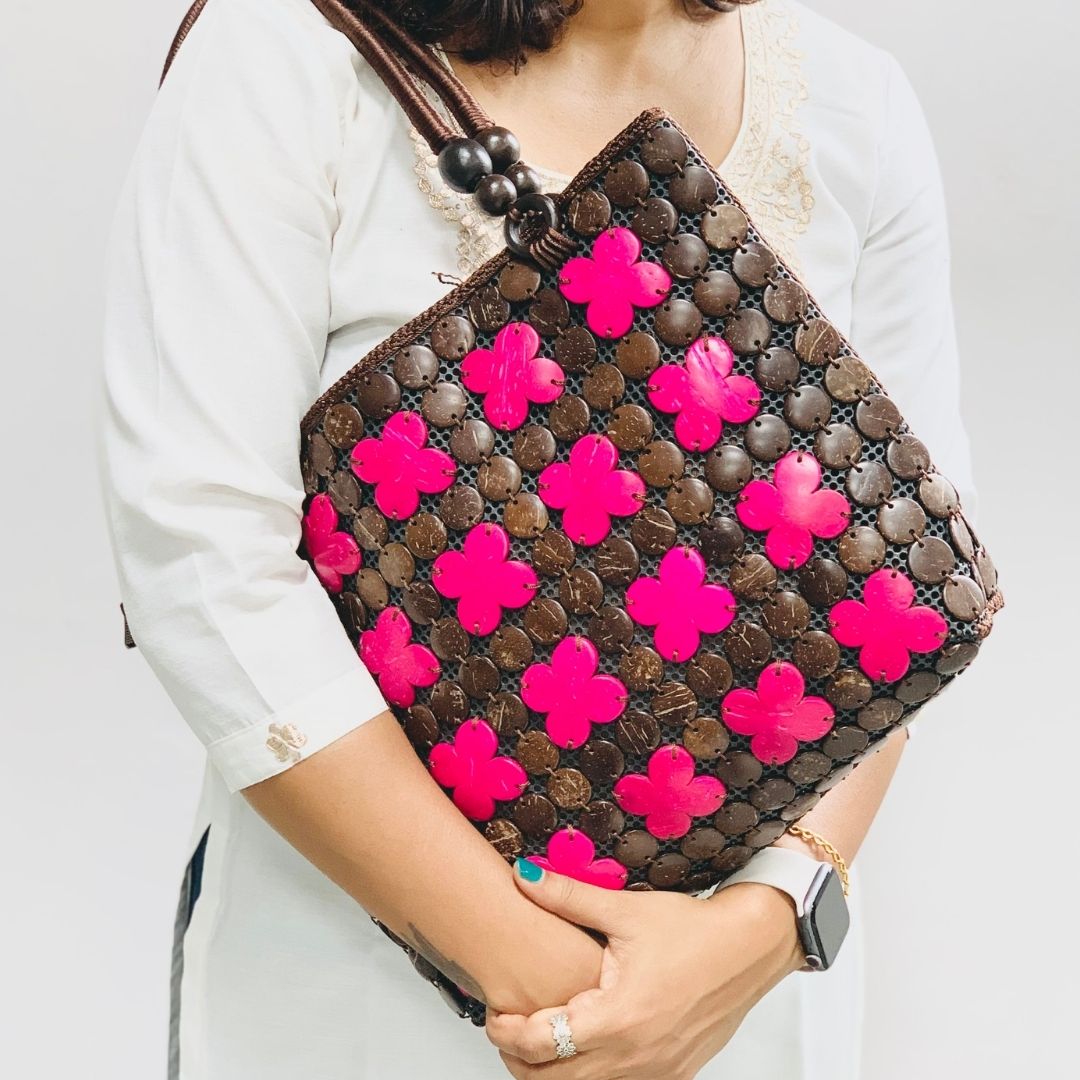 Women carrying natural coconut shell handbag