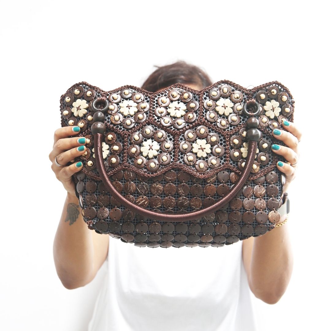 DaisyLife Real coconut shells sling bag on a model