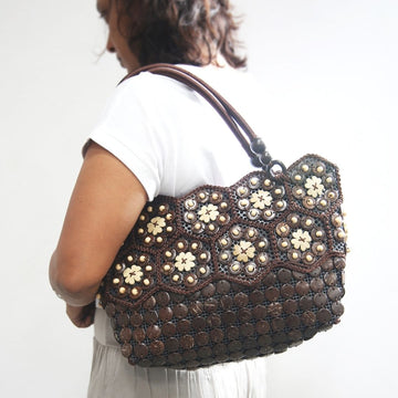 Real coconut shells sling bag on a model 