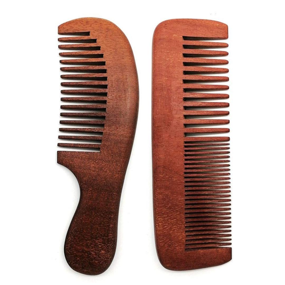 Close up of Dark wood combs in big and combination teeth, for all kinds of hair!