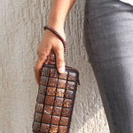DaisyLife natural coconut shell cubes clutch wristlet bag on model