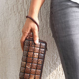 DaisyLife natural coconut shell cubes clutch wristlet bag on model