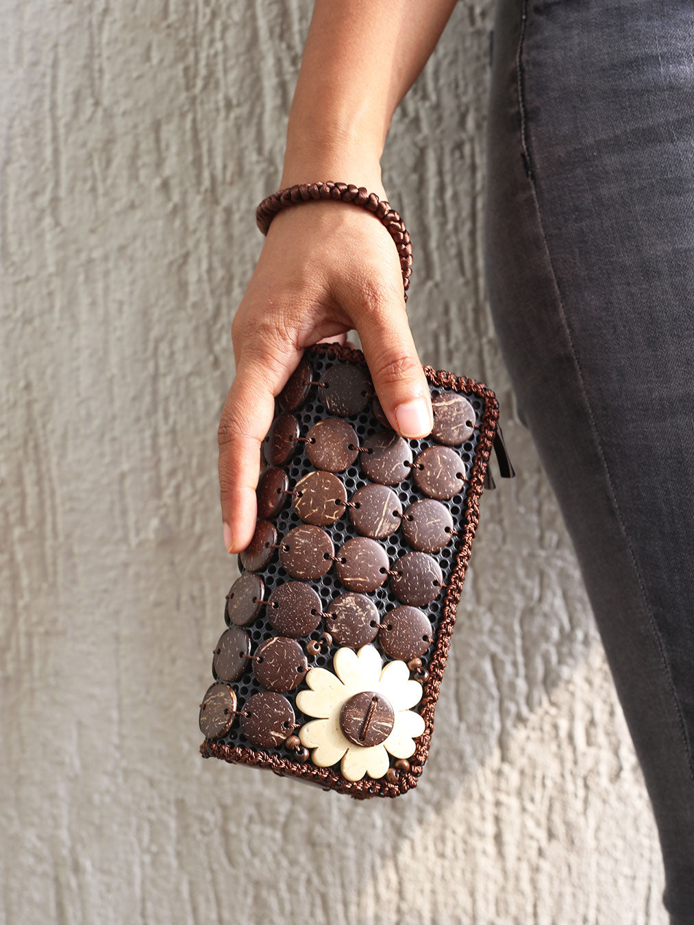 DaisyLife natural coconut shell brown fashion clutch wristlet bag on model