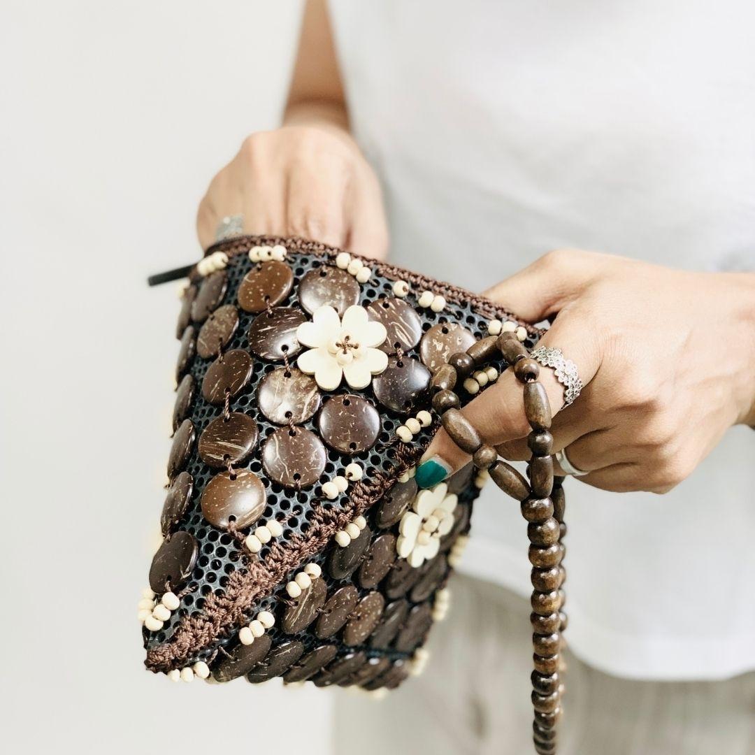 Close up of Natural coconut shells Fancy Samosa Wristlet Bag