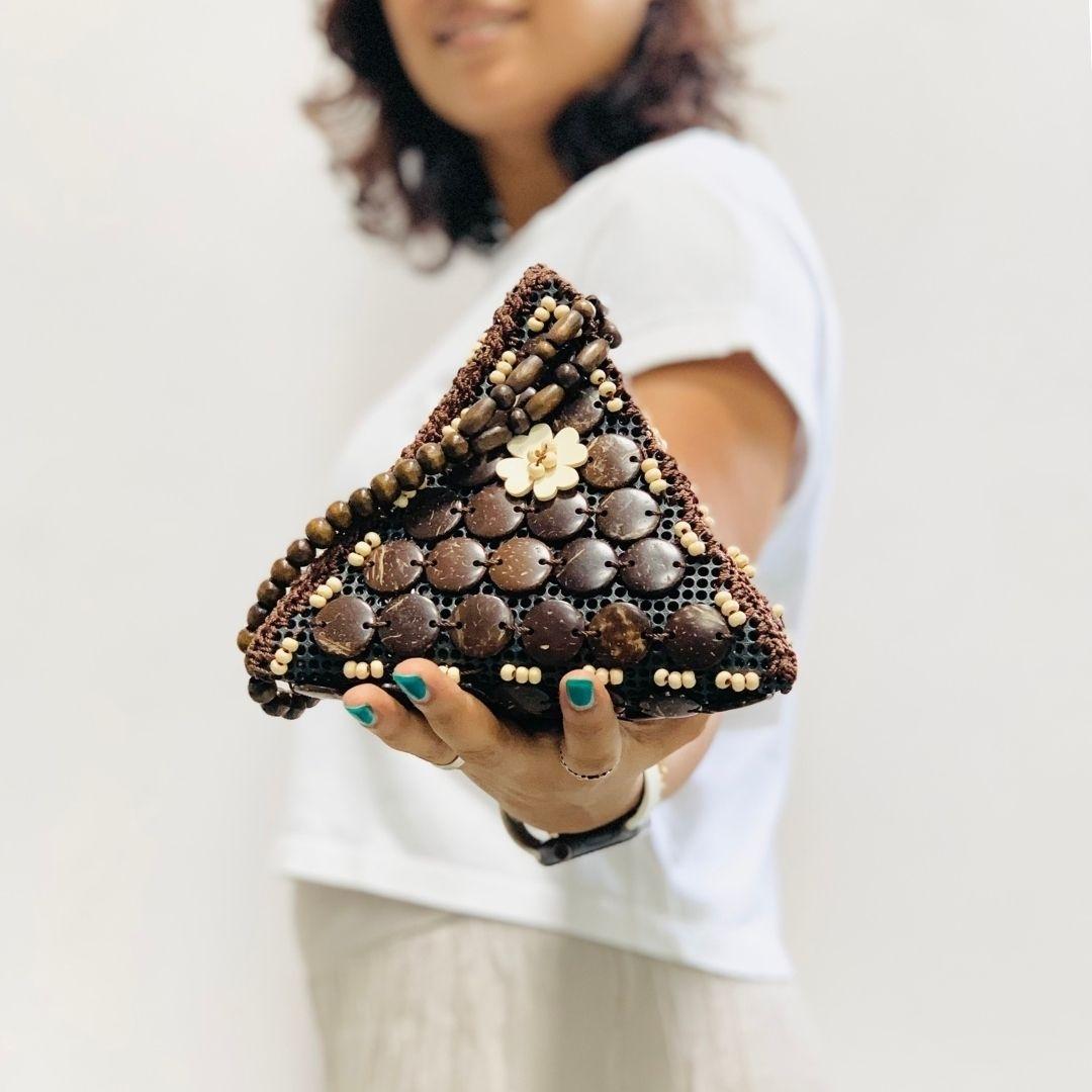 Close up of Natural coconut shells Fancy Samosa Wristlet Bag