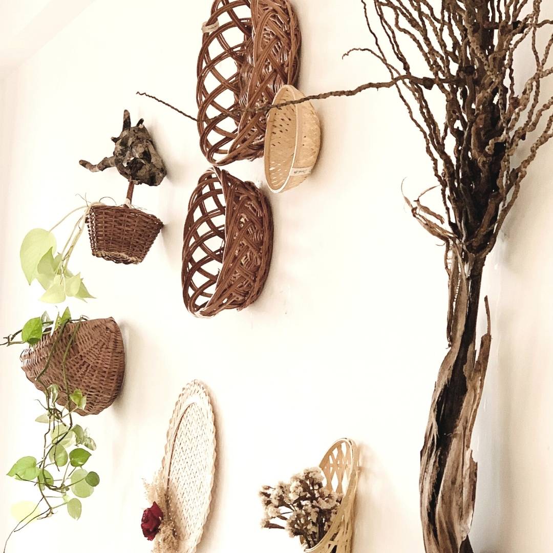 Side view of Forest/ woods basket arrangement for wall decor above dining table