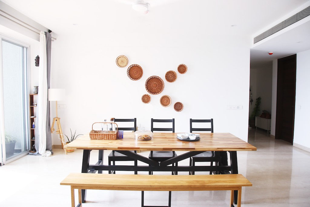 Basket put on wall for wall decor on dining table