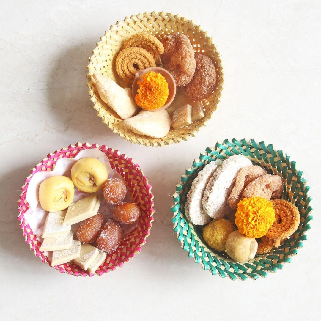Sweets kept inside Simple & beautiful bamboo serving, Beautifully woven bamboo baskets.