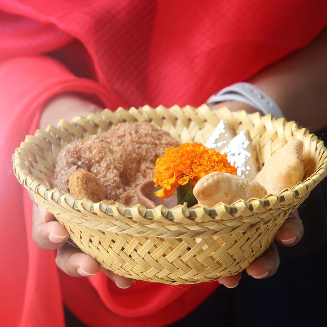 Sweets kept inside Simple & beautiful bamboo serving, Beautifully woven bamboo baskets.