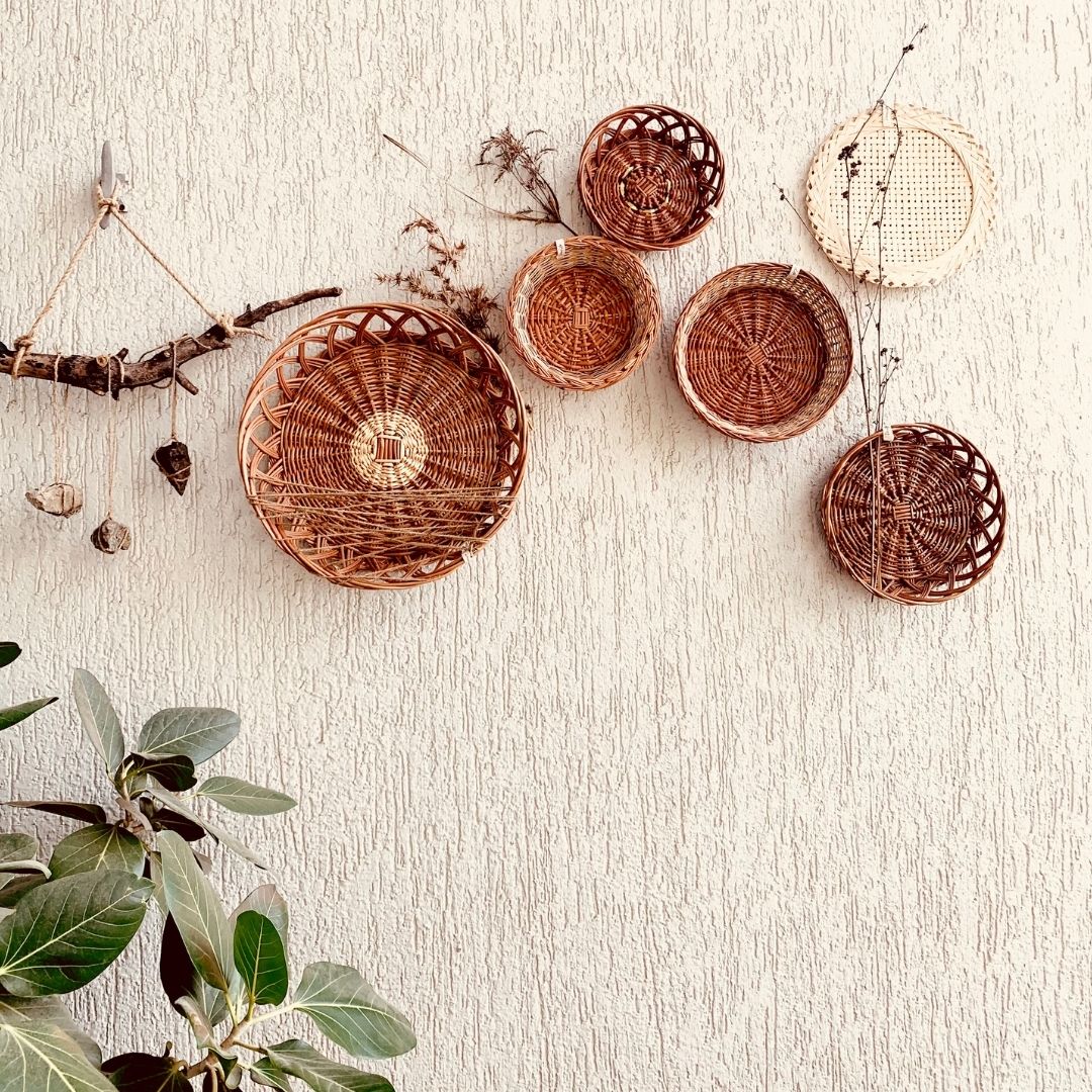 Mountain structured wall baskets decor in balcony with stones, and branches used as props