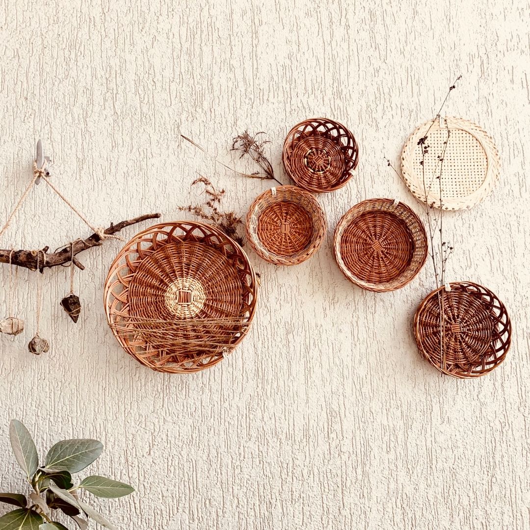 Mountain structured wall baskets decor in balcony with stones, and branches used as props