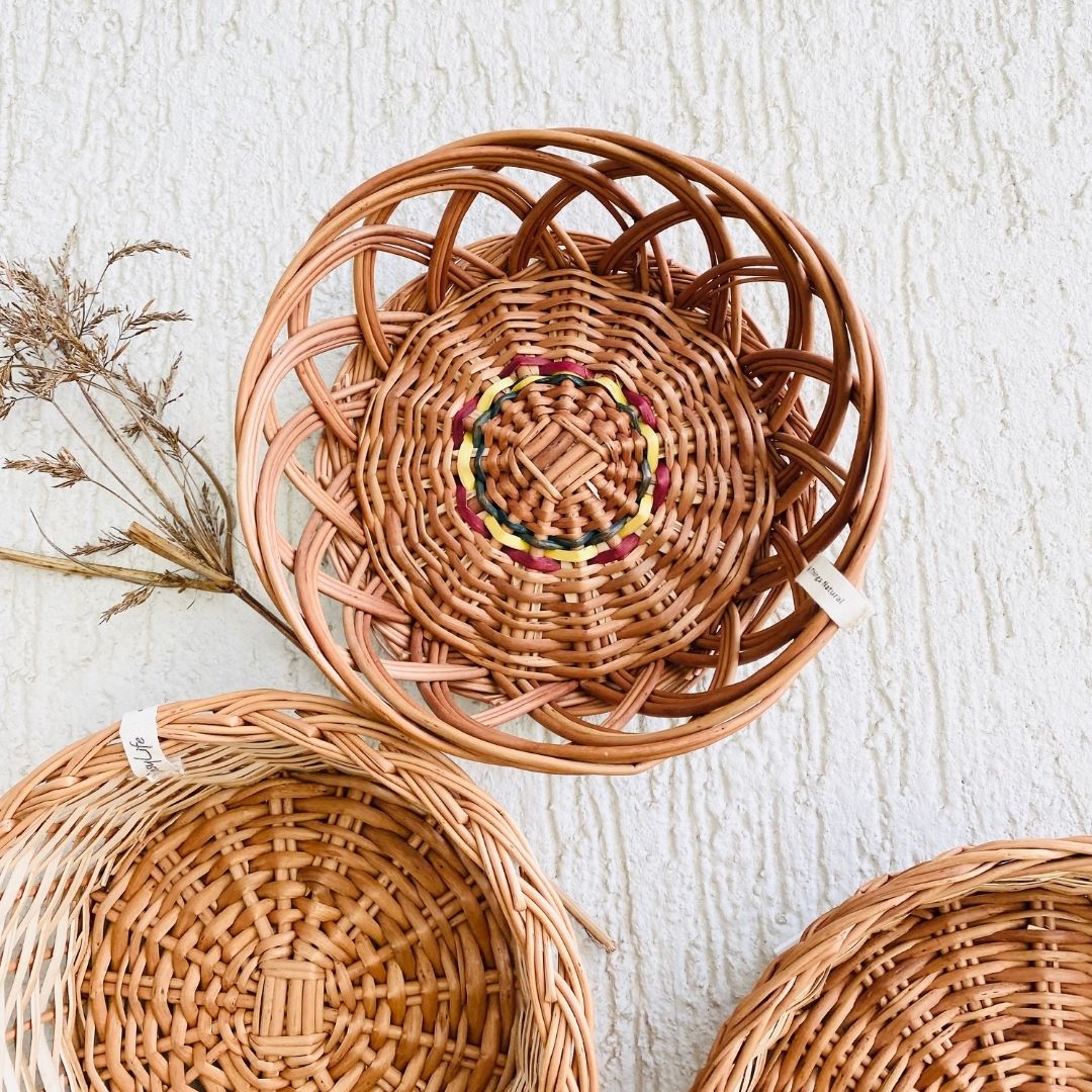 Crown wicker basket used in wall basket arrangement.