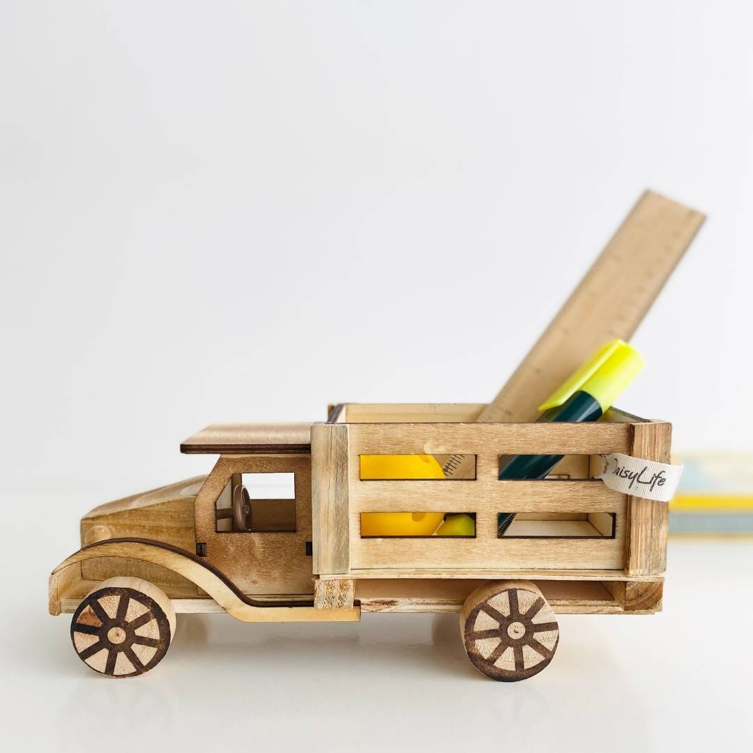 Stationery inside DaisyLife's natural wooden truck