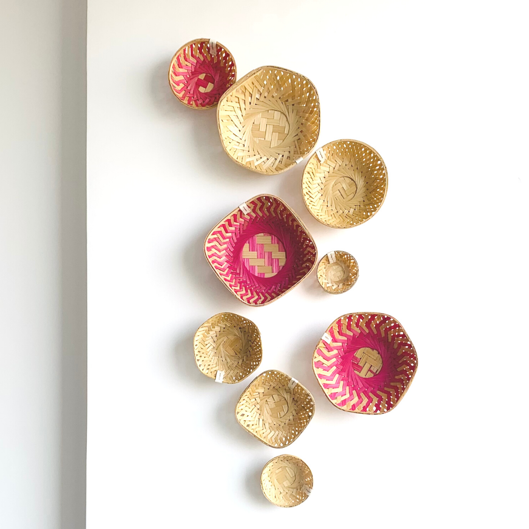 Natural and colourful basket on wall as wall decor