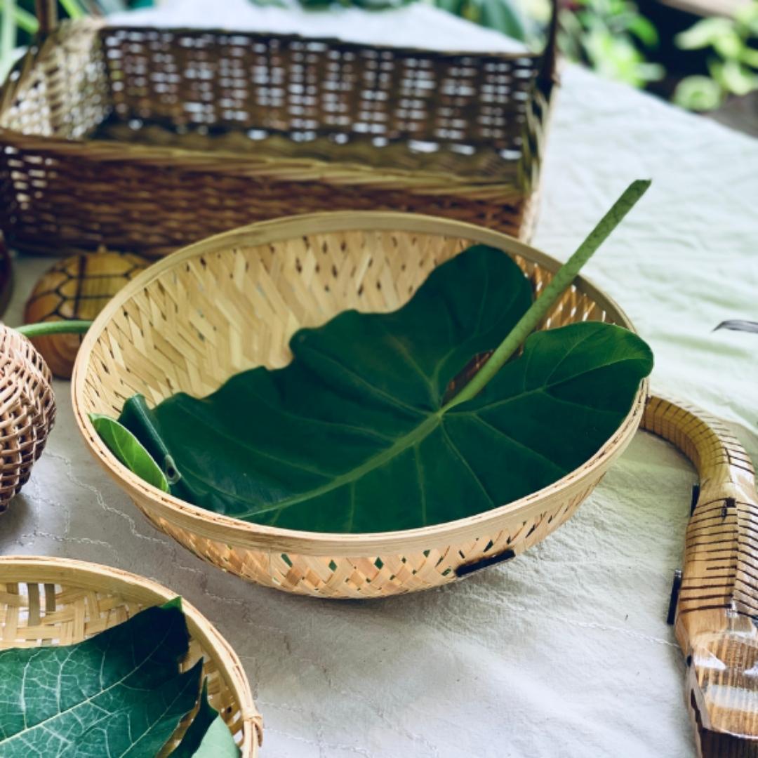 Simple, round, natural multi-purpose bamboo basket for serving food 