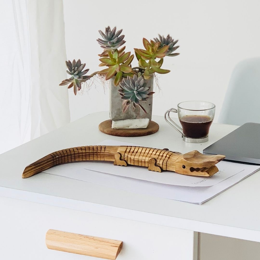 "Jaws" Wooden Alligator use as a work table accessory.
