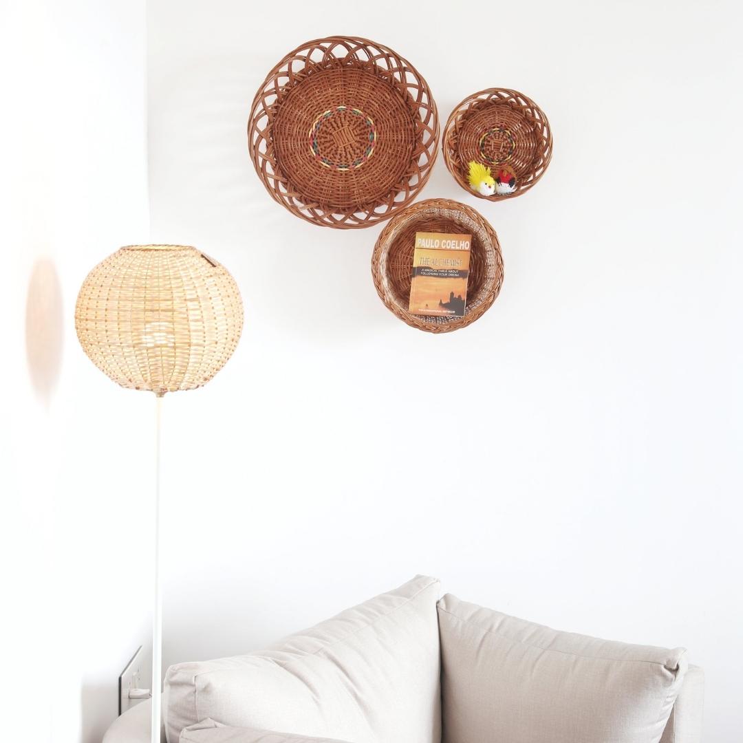 Trio Wall Baskets with book inside the basket with wicker lantern 