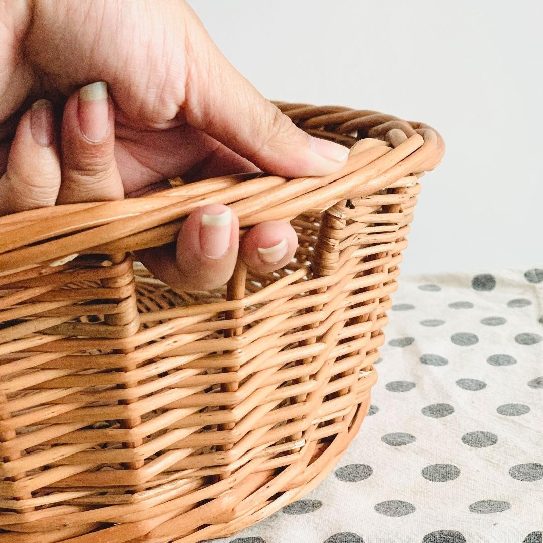Close up of Wicker BB Oval basket for laundry, storage, and organising