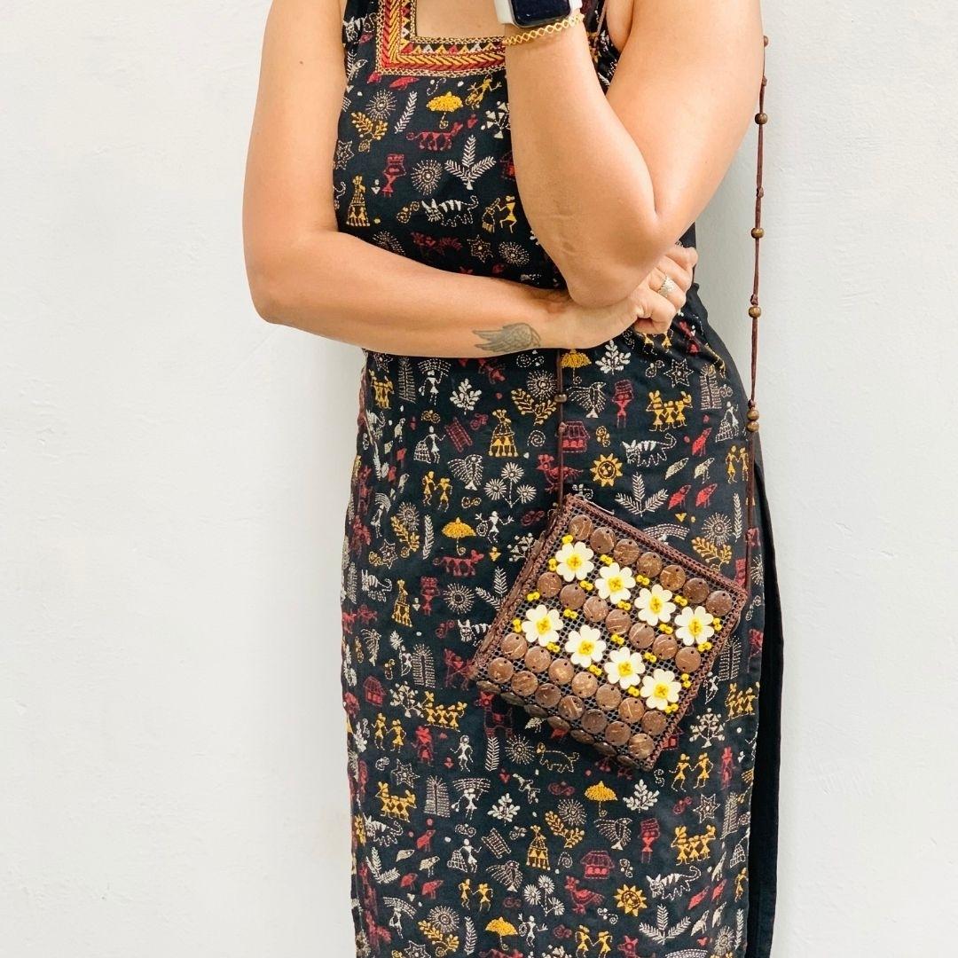 A girl carrying a neat flat passport shape in a sling to carry around easily or pack in travel bag