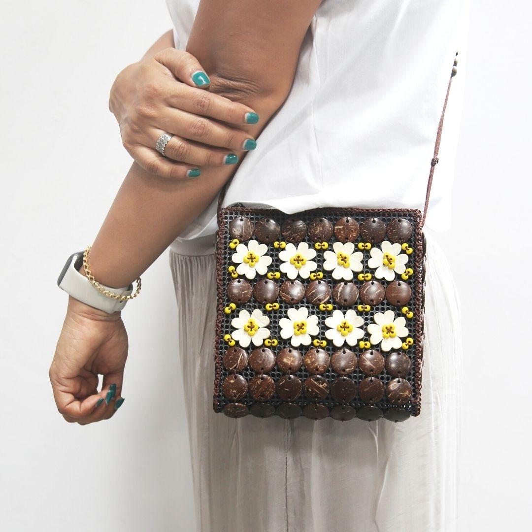 A girl carrying a neat flat passport shape in a sling to carry around easily or pack in travel bag