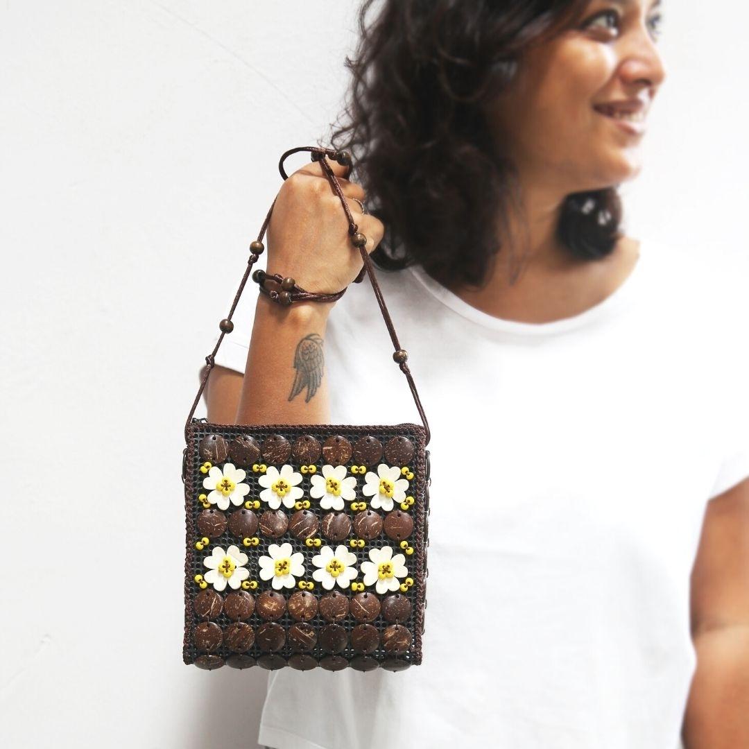 A girl carrying a neat flat passport shape in a sling to carry around easily or pack in travel bag