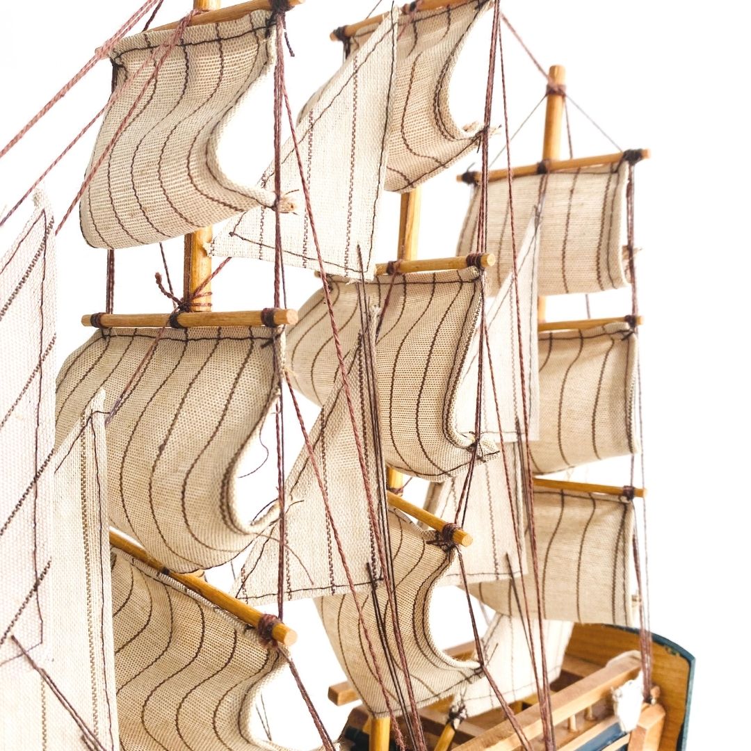 Close up of DaisyLife Wooden ship in white background