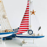 Wooden Natural coral/Seashell ship with red flag