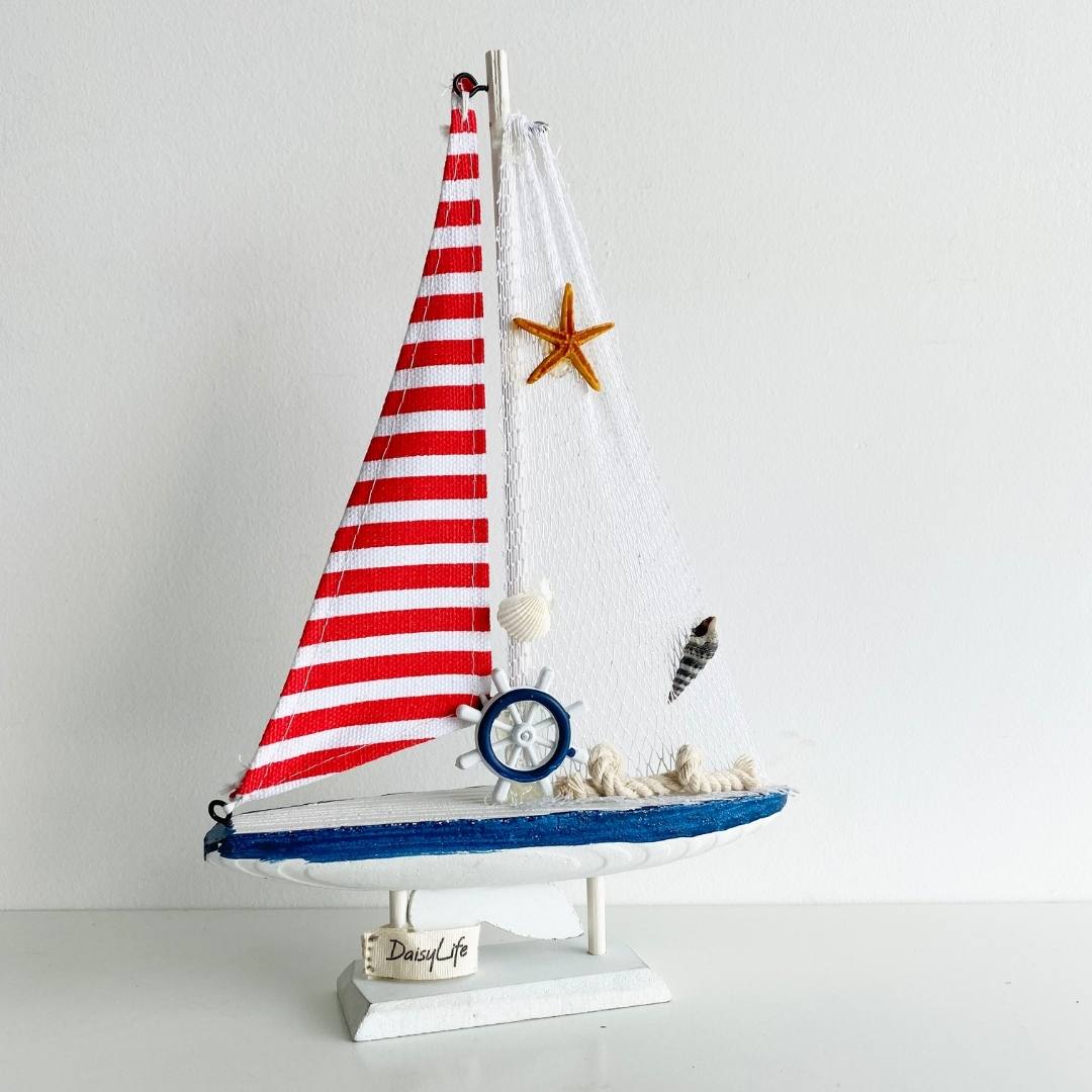 Wooden Natural coral/Seashell ship with red flag