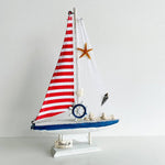 Wooden Natural coral/Seashell ship with red flag