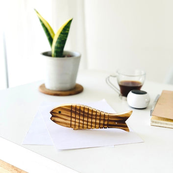 Flexible wooden fish for office decor
