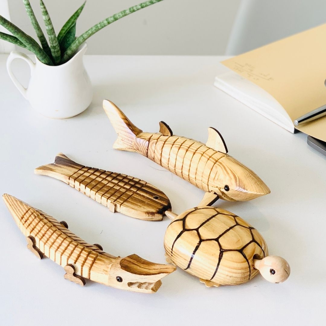Natural and Eco-friendly Natural Wooden animal range kept on office table