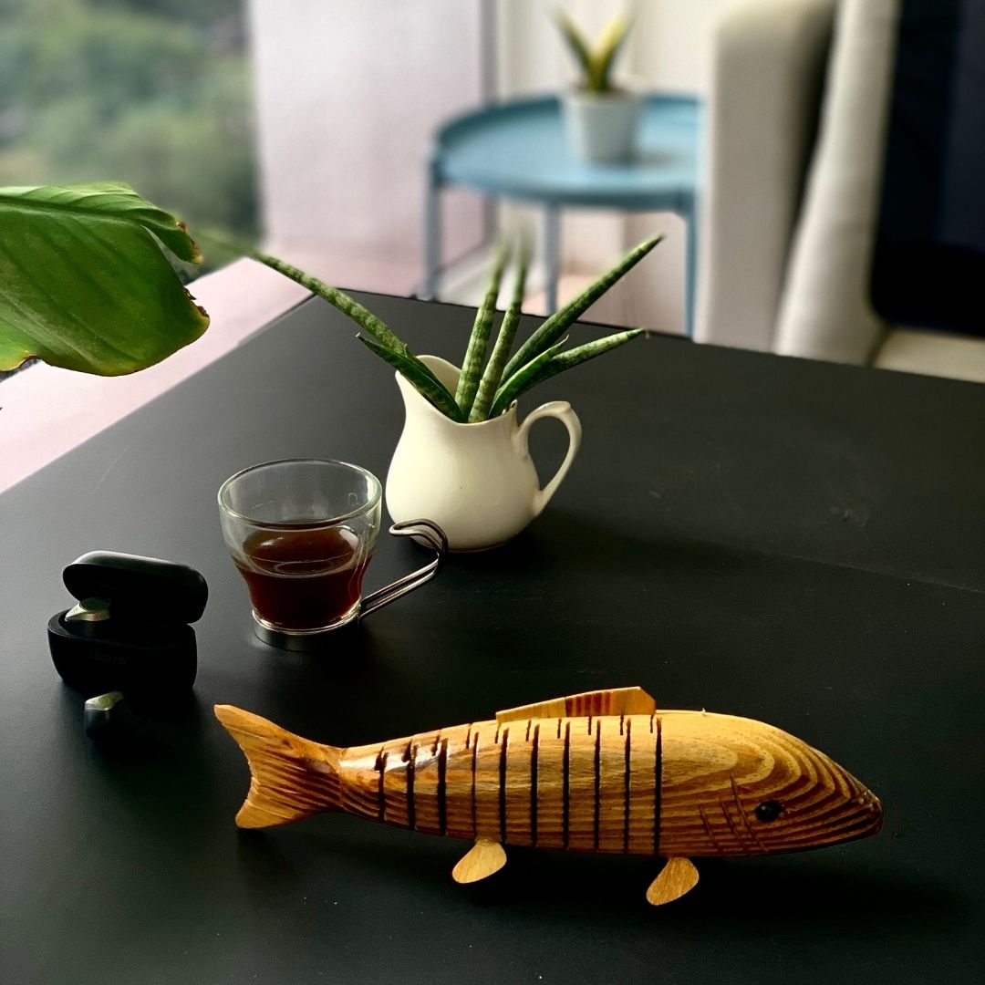 Close up of "Bubbles" Wooden Fish in office setup. 