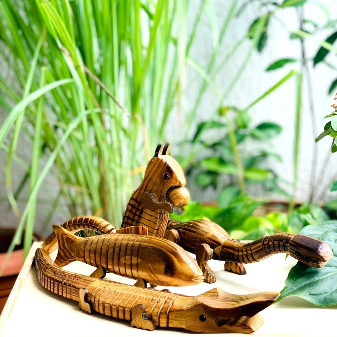 DaisyLife "Skippy" Wooden Squirrel with Chestnut , plants are kept in background