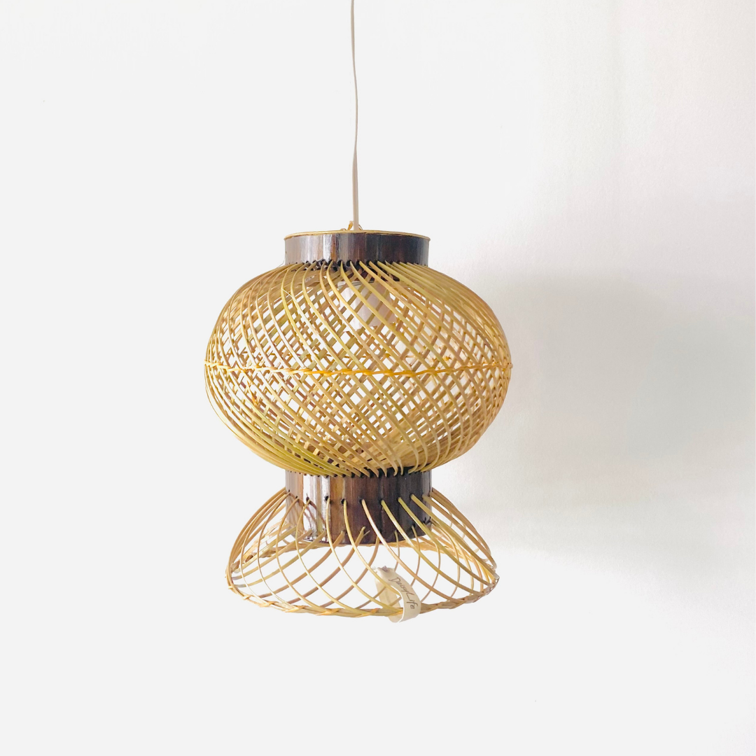 Finely woven natural bamboo lampshade.