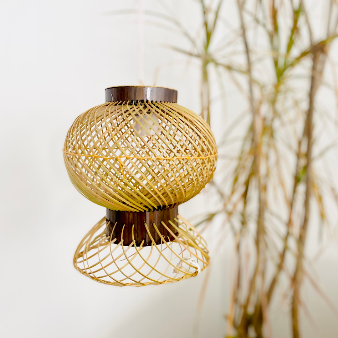 Leaves behind Finely woven natural bamboo lampshade.
